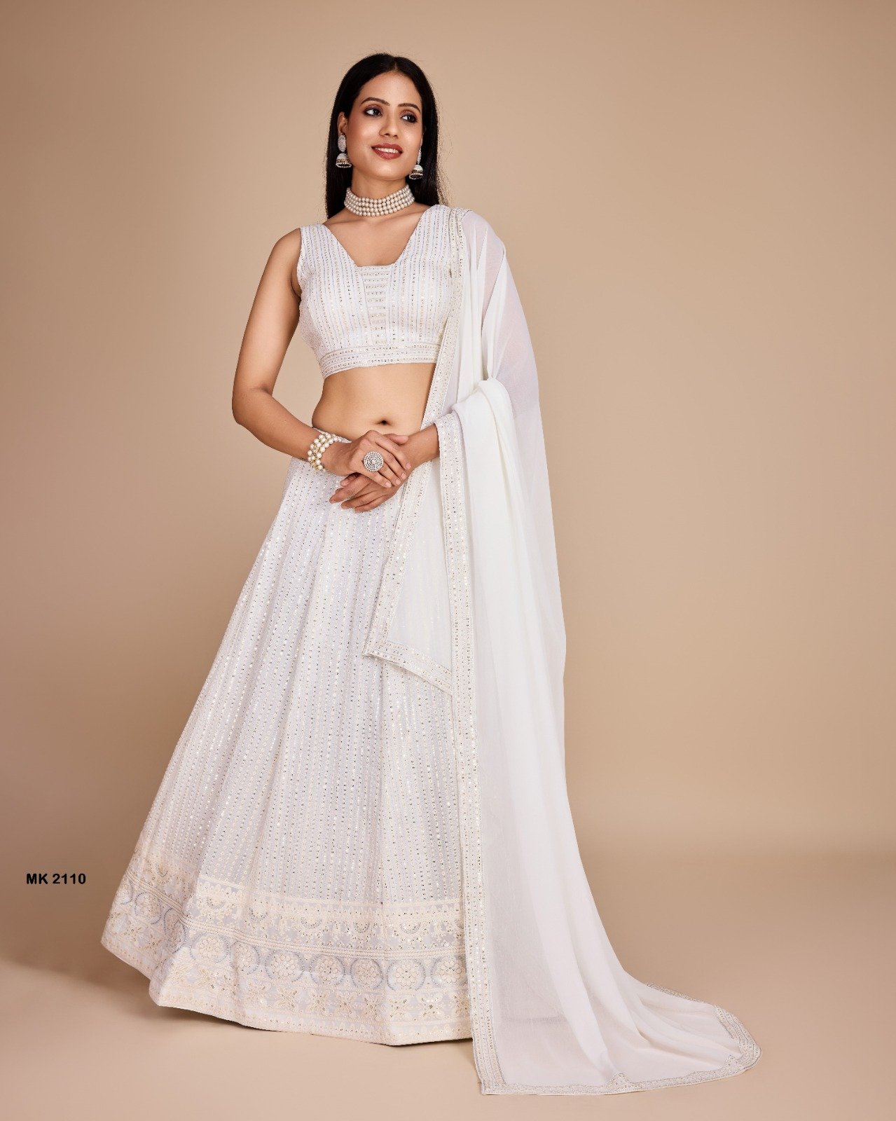 WhatsApp Image 2026-04-14 at 4.31.19 PM Zinora Designer White Lehenga Choli for Women – Heavy Georgette Embroidered Bridal & Festive Wear - Image 1